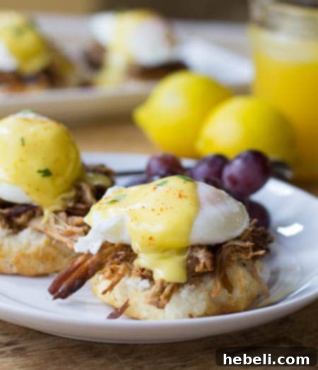 Southern Eggs Benedict served on a white plate.