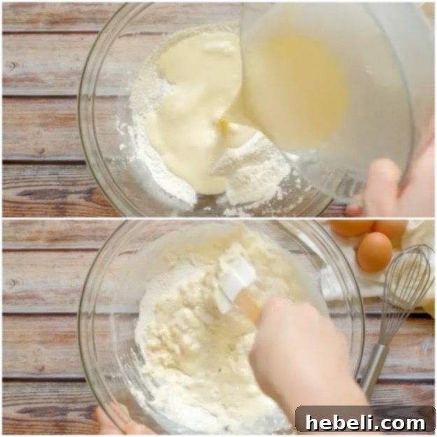 Fluffy Buttermilk Pancakes 5 Pancake batter being gently mixed in a bowl, showing a slightly lumpy but combined consistency.