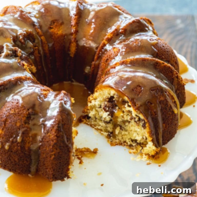 The Pecan Pie Universe 18 A beautifully molded Pecan Pie Bundt Cake, drizzled with a sweet brown sugar glaze.