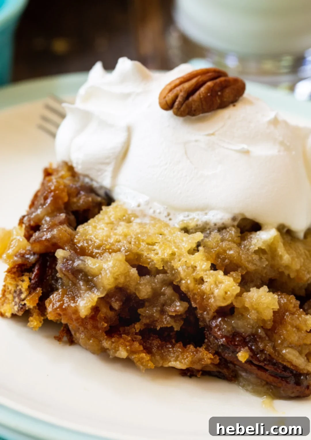 The Pecan Pie Universe 9 A tempting slice of Pecan Pie Cake, offering all the flavors of pecan pie in a delicious cake form.