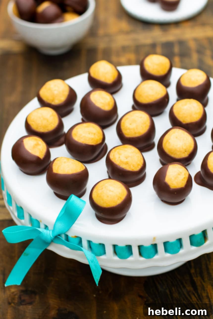Buckeye Balls on a cake stand.