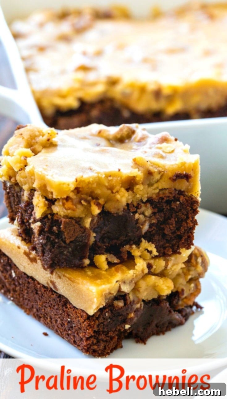Two Praline Brownies stacked on top of each other, highlighting the thick praline frosting.