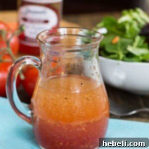 Sweet Heat Pepper Vinaigrette 2 Red Pepper Jelly Vinaigrette in a serving dish.