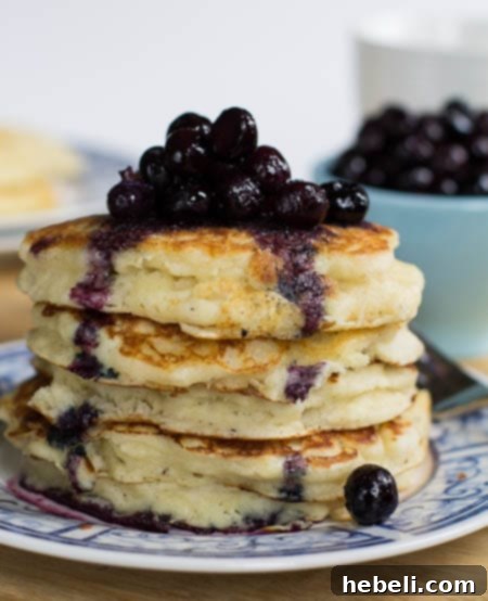 Delicious buttermilk pancakes with homemade blueberry compote ready to serve