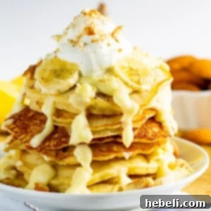 Banana Pudding Pancakes stacked on a plate.