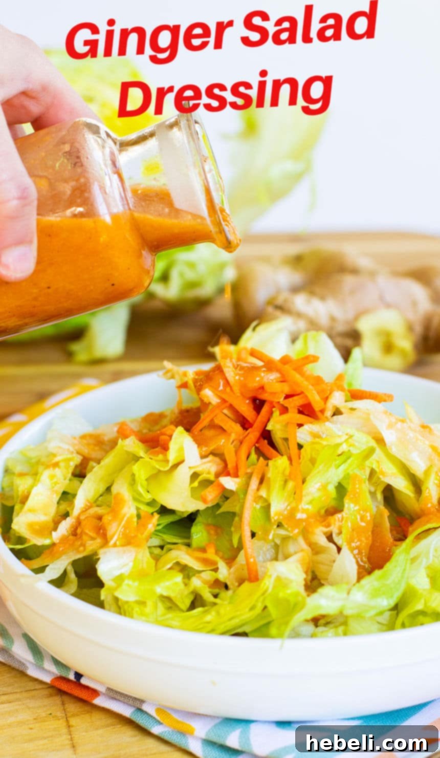Zesty Ginger Vinaigrette 5 Large image of Ginger Salad Dressing bottle next to a bowl of salad.
