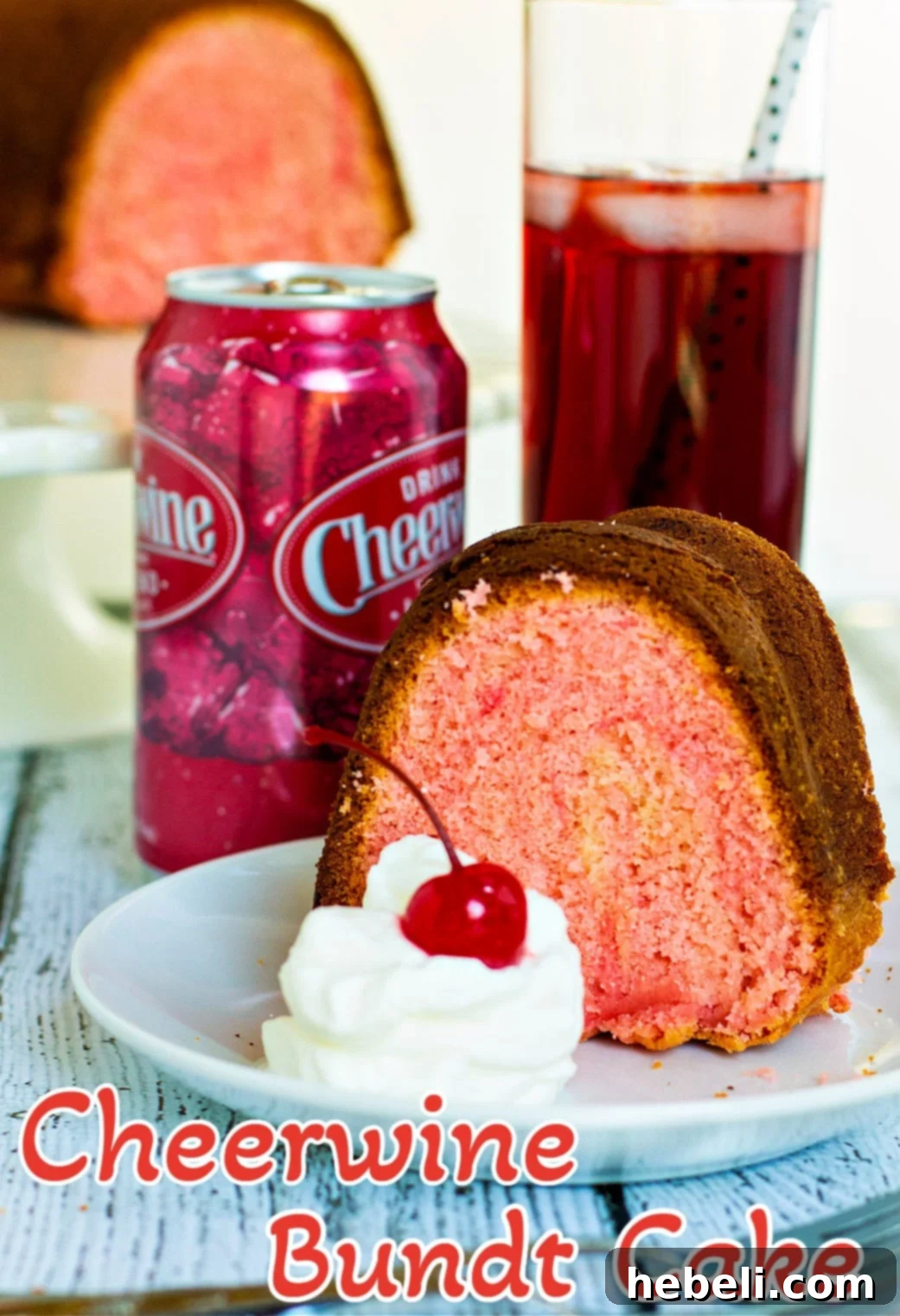 A pristine slice of Cheerwine Bundt Cake on a decorative plate, ready to be enjoyed.