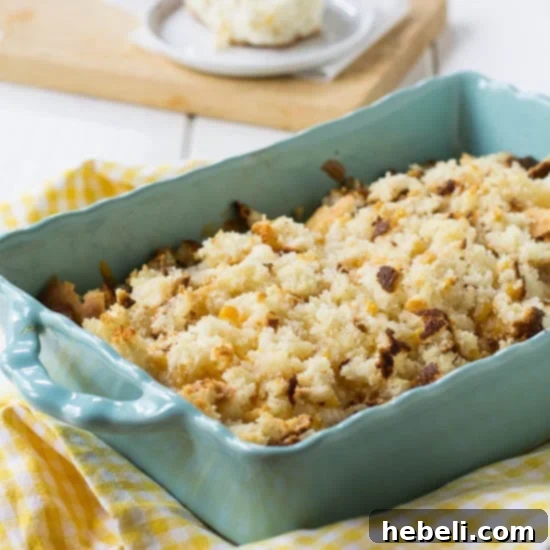 Close-up of a serving of Chicken Cornbread Casserole, highlighting the moist chicken and fluffy cornbread