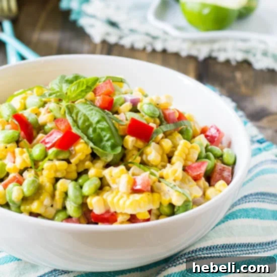 Vibrant Roasted Corn and Edamame Salad 2 Vibrant Roasted Corn and Edamame Salad in a bowl, showcasing fresh ingredients.