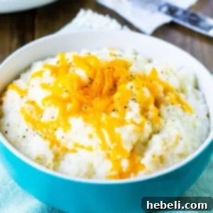 Bowl full of crockpot grits, close up.