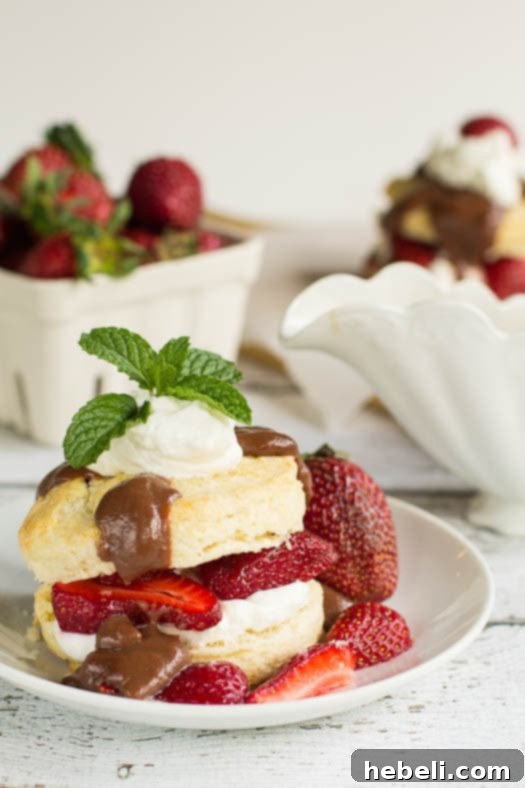 Prepared Strawberry Shortcake Biscuits with Chocolate Gravy on a plate