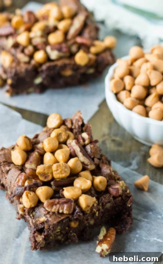 Close-up of a single butterscotch-pecan brownie with a gooey center
