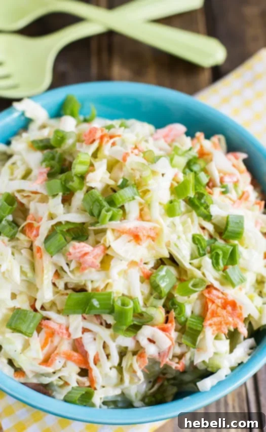 Buttermilk Coleslaw ingredients, showcasing fresh cabbage and carrots.