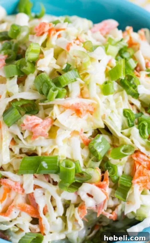 Close-up of shredded cabbage and carrots for buttermilk coleslaw.