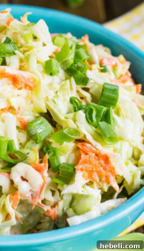 Finished Buttermilk Coleslaw in a serving bowl, ready to enjoy.