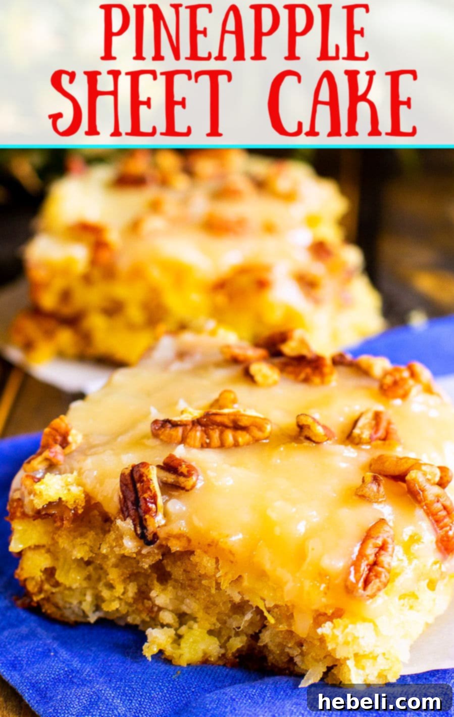 A beautifully frosted Pineapple Sheet Cake with coconut and pecans on top, ready to be enjoyed.