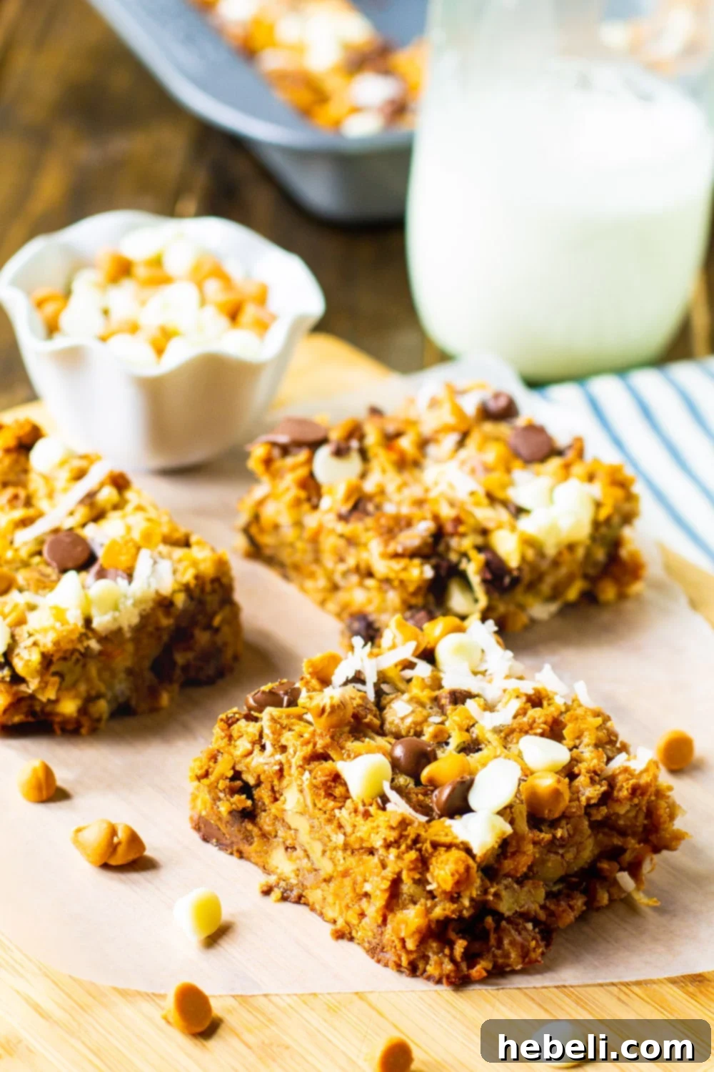 Hello Dolly Bars cut into squares, showcasing their golden-brown top and distinct layers.