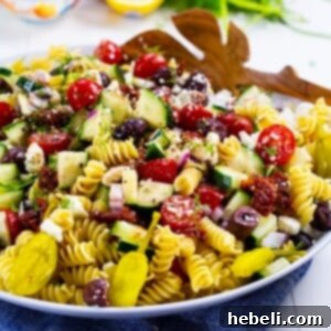 Zesty Greek Pasta Salad 6 Close-up of a vibrant Greek Pasta Salad, showcasing the fresh ingredients and pasta.
