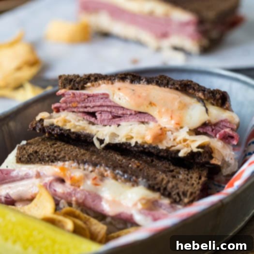 Reuben with a Kick 5 A tantalizing close-up of a golden-brown Spicy Reuben sandwich, perfectly grilled with Swiss cheese oozing over the edges, sliced in half to reveal its inviting layers of filling. It's presented on a wooden cutting board.