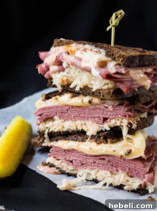 Reuben with a Kick 6 A Spicy Reuben sandwich, freshly grilled to a perfect golden crisp and sliced, sits invitingly on a wooden cutting board, showcasing its delicious layers and melted cheese.