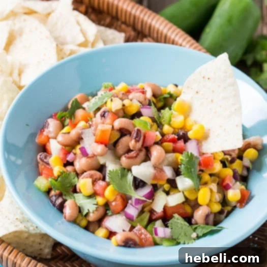 Serving Texas Caviar with tortilla chips