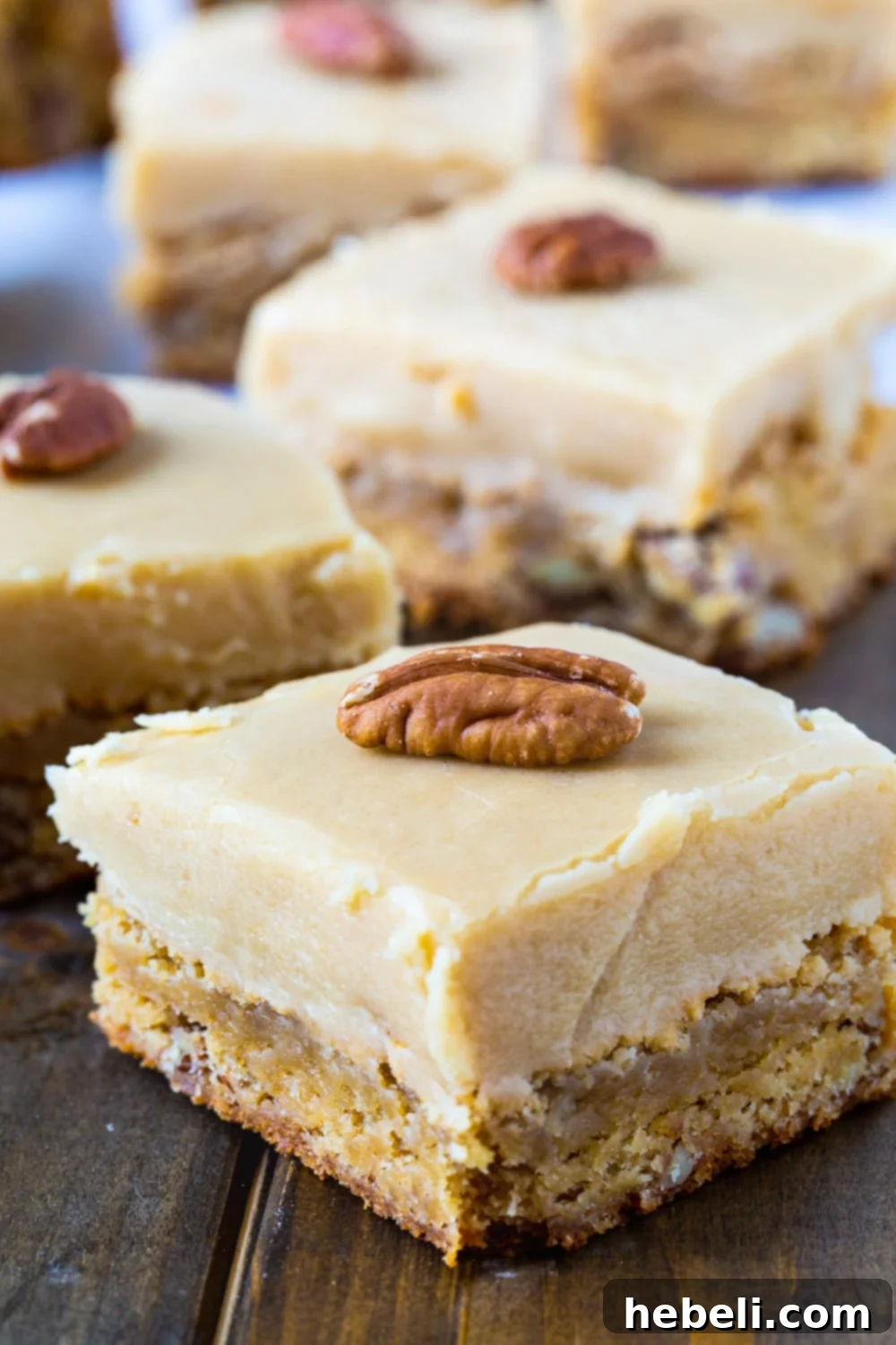 Blondie squares perfectly arranged on a rustic wooden board, ready to be enjoyed.