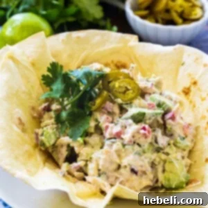 Bold Jalapeno Chicken Salad 5 Jalapeño Chicken Salad in a tortilla shell, ready to serve.