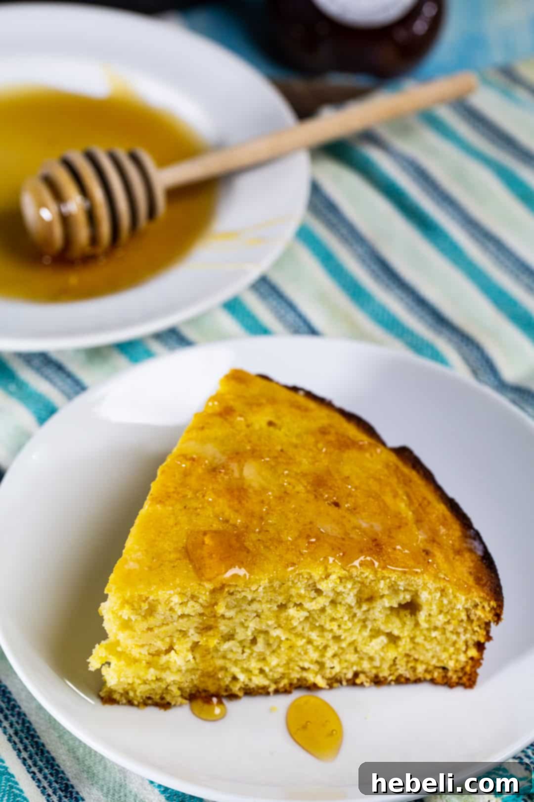Honey Cornbread slice on a plate.