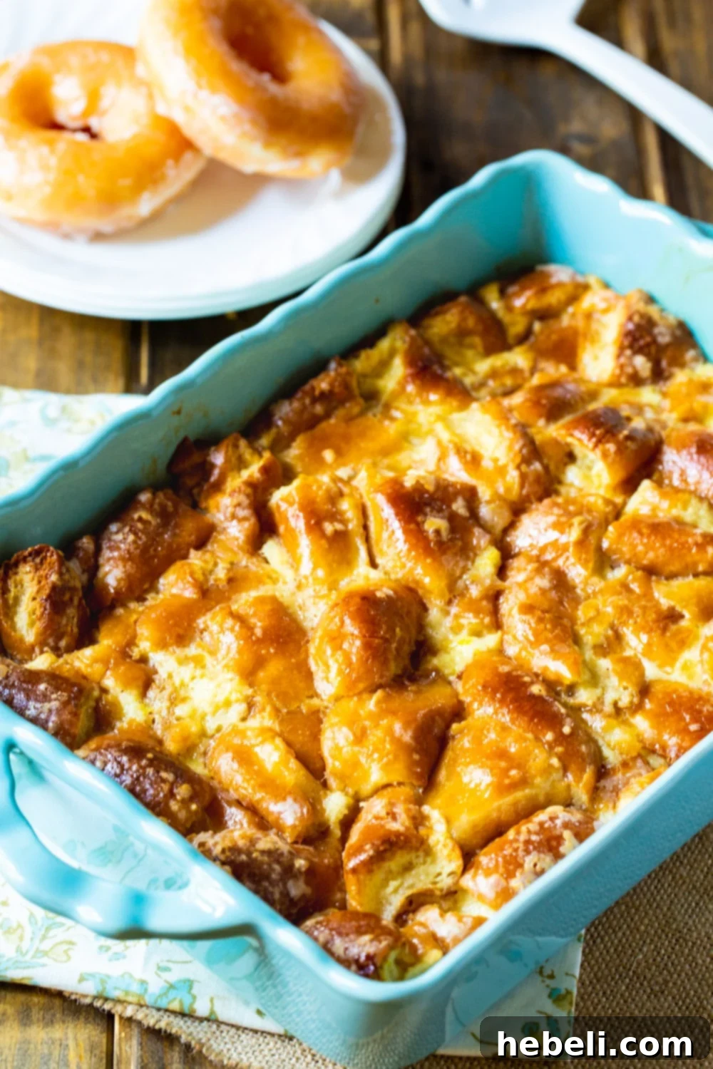 Close-up of Krispy Kreme Bread Pudding, rich and golden brown.