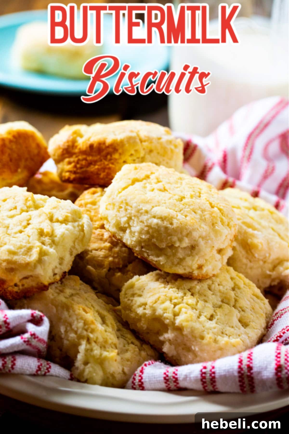 Callie's Fluffy Buttermilk Biscuits 5 A basket full of warm, golden Callie's Buttermilk Biscuits, perfect for a family meal.