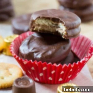 Rolo Ritz Caramel Delights 4 Delicious Chocolate Covered Ritz Crackers stuffed with Rolos, a simple yet decadent dessert.