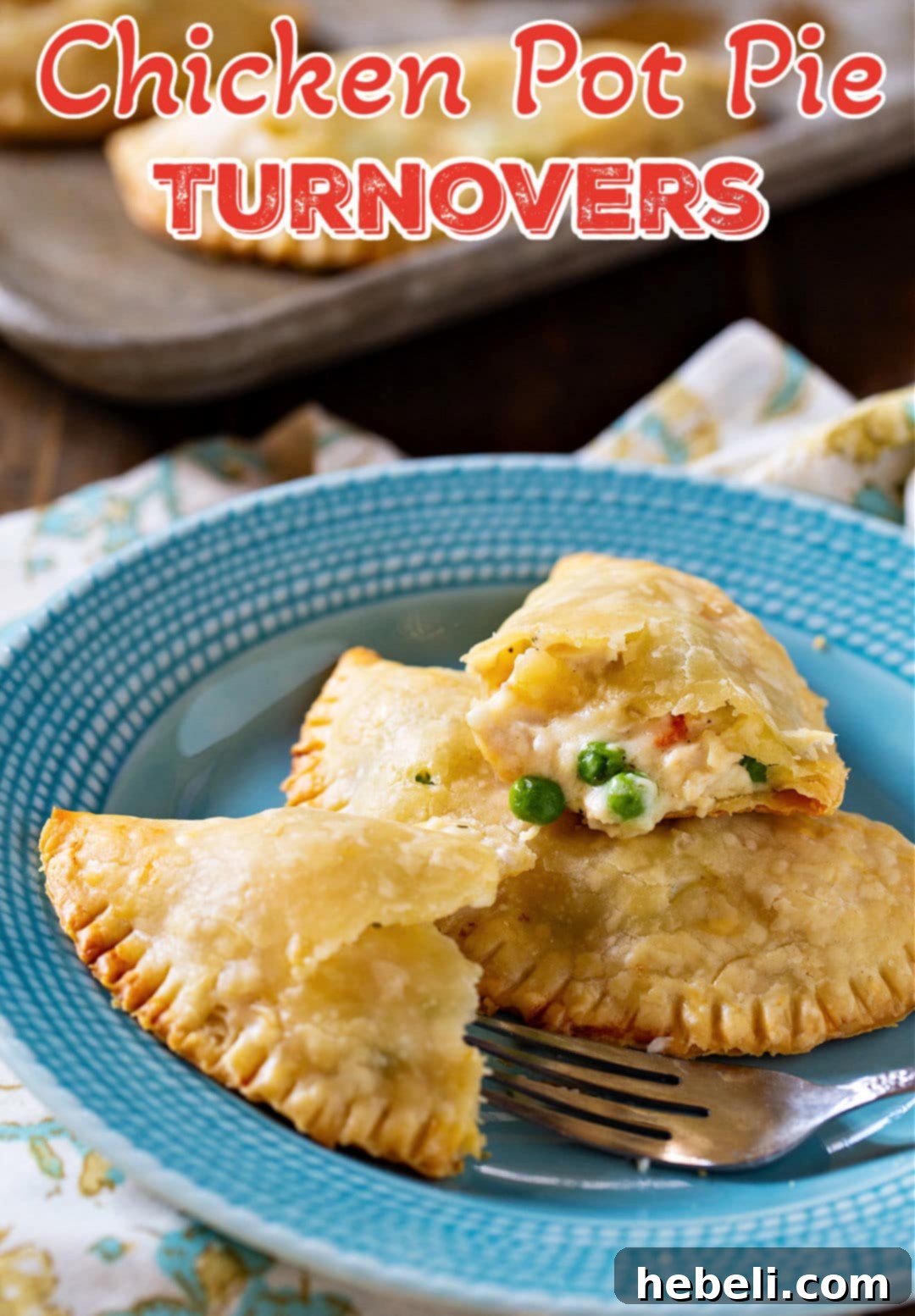 Several Chicken Pot Pie Turnovers arranged artfully on a plate, ready to be served.