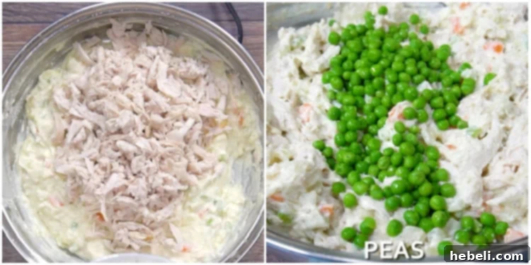 Adding cooked chicken and peas to the pot pie filling.