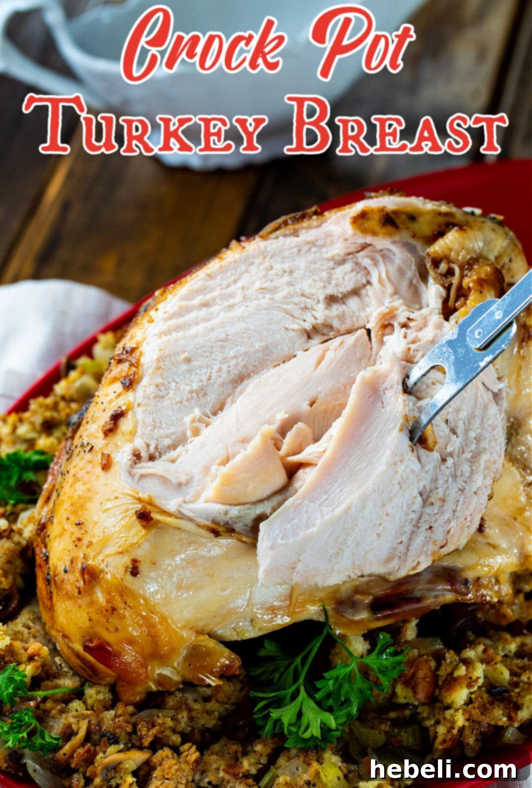 Juicy Slow Cooker Turkey Breast 5 A beautifully presented Crock Pot Turkey Breast on a festive serving platter, ready for the table.
