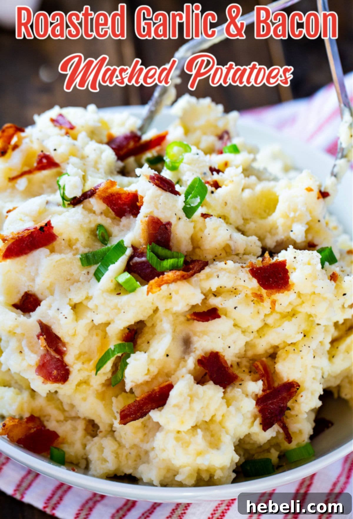 A close-up shot of a potato masher pressing down into a pot of tender, cooked potatoes, ready to be transformed into creamy mashed potatoes.