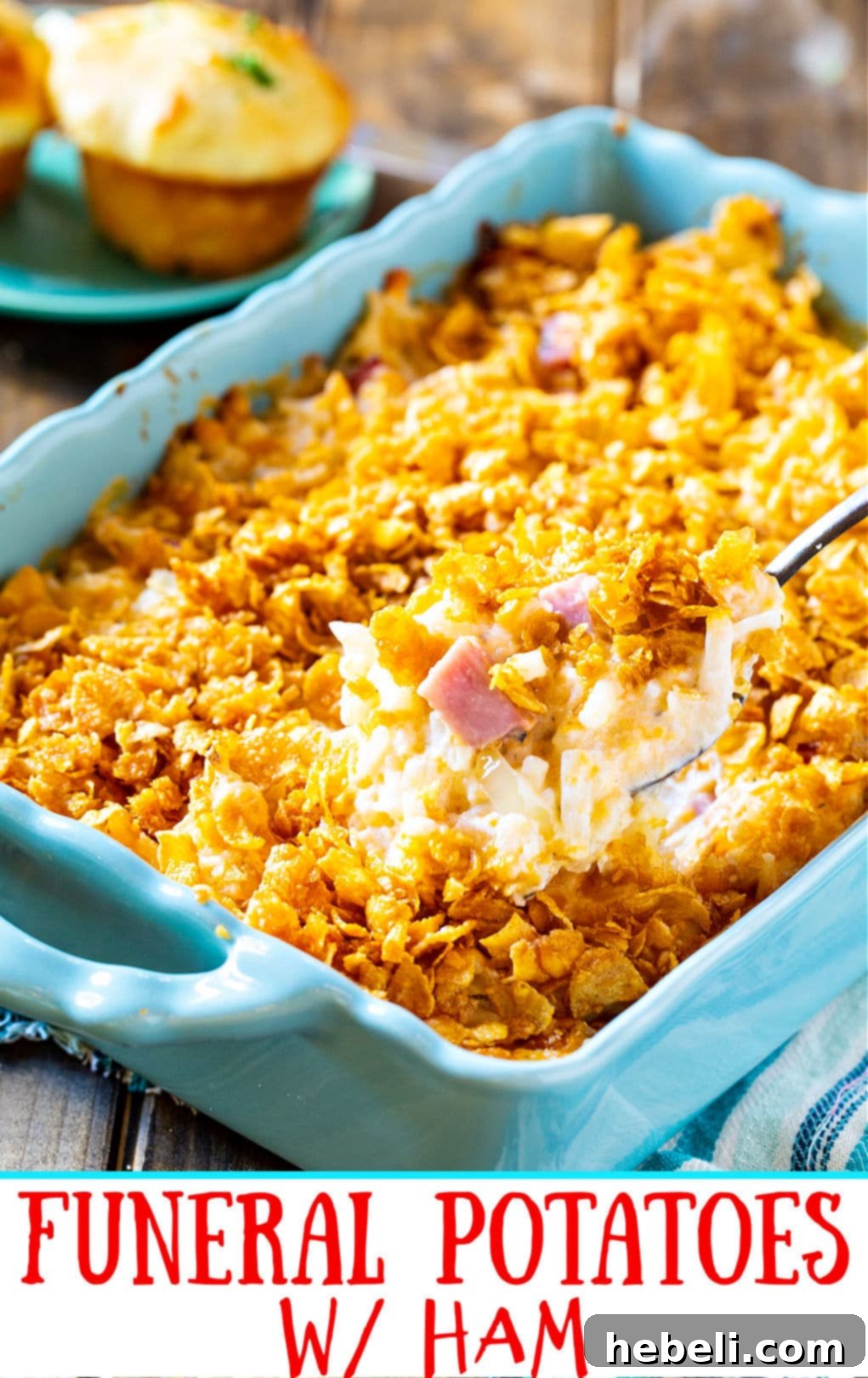 Casserole being scooped out of casserole dish.
