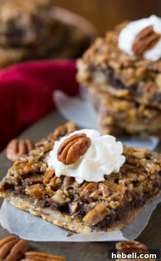 Chocolate Chip Pecan Pie Bars - all the flavor of a pecan pie in easy to eat bar form, a perfect party treat