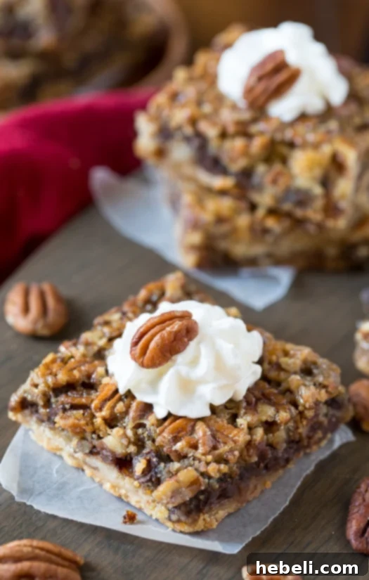 Chocolate Chip Pecan Pie Bars- all the flavor of a pecan pie in easy to eat bar form!, a festive holiday treat