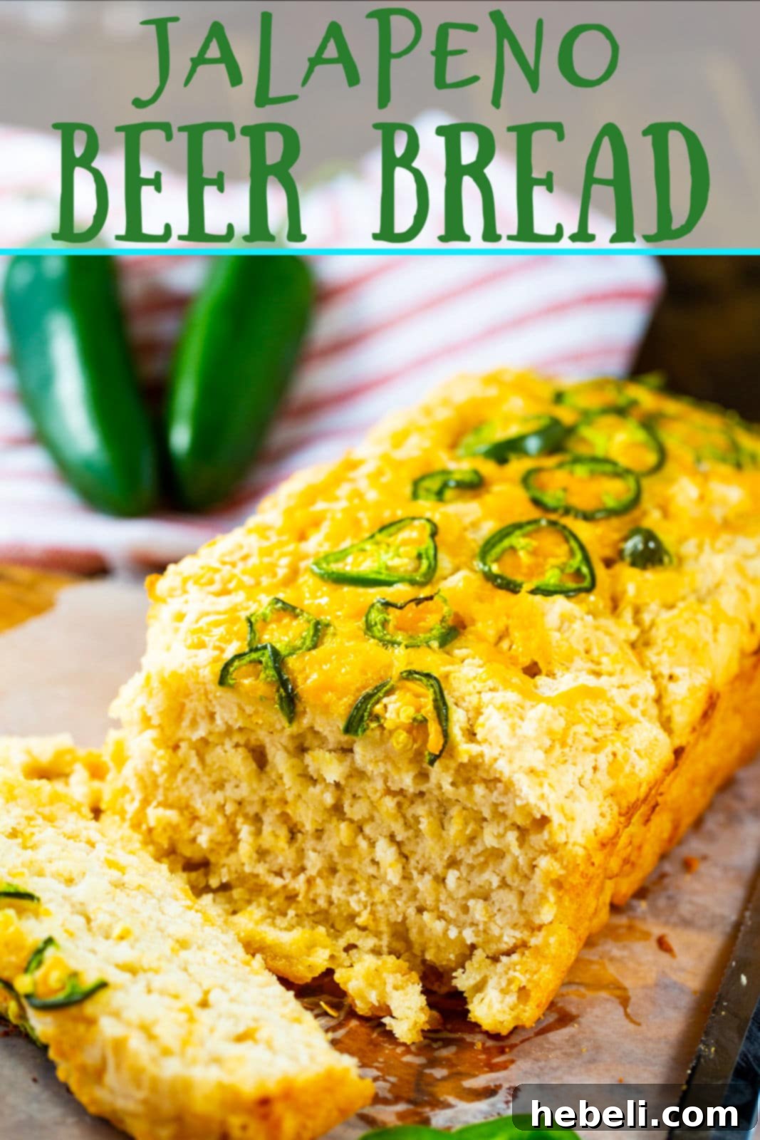 A freshly baked loaf of Jalapeno Beer Bread cooling on a wire rack.