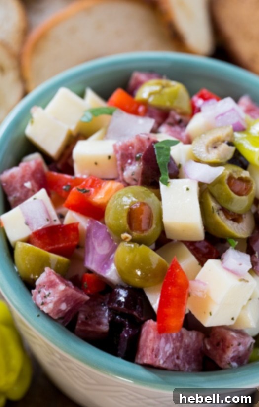 French Onion and Muffaletta Dips 12 Muffaletta Dip with cheese, salami, and olives, served as a delightful make-ahead party food