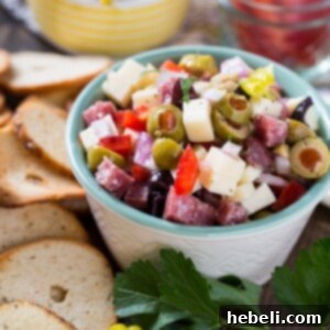 French Onion and Muffaletta Dips 14 Muffaletta Dip with a clear focus on the delicious ingredients