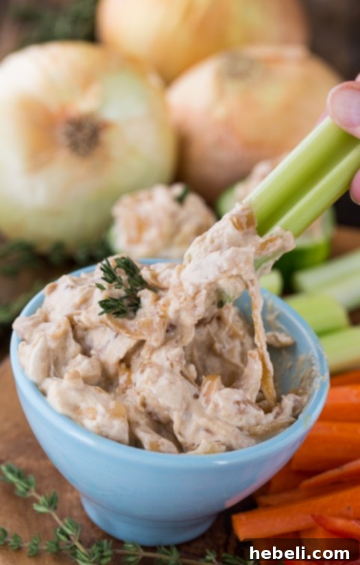 French Onion and Muffaletta Dips 4 Healthier French Onion Dip made with Greek Yogurt, garnished with fresh herbs