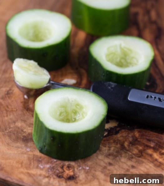 French Onion and Muffaletta Dips 7 Close-up of french onion dip served in elegant cucumber cups