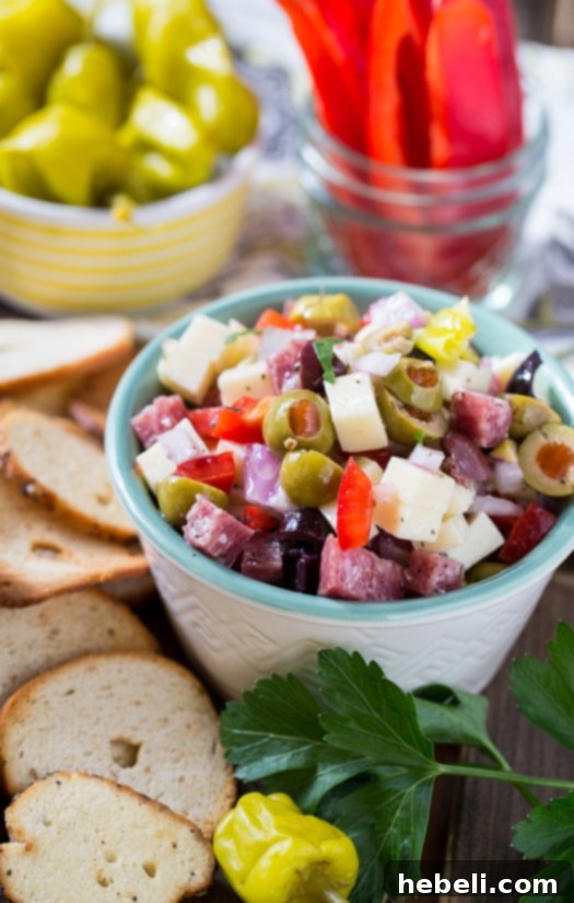 French Onion and Muffaletta Dips 10 Muffaletta Dip with small diced cheese, salami, and olives, a perfect make-ahead party food