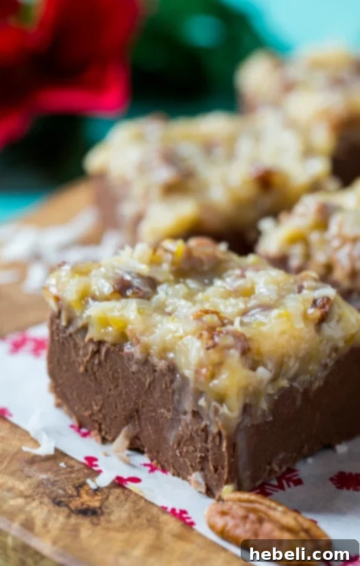 Decadent German Chocolate Fudge 4 Sliced squares of German Chocolate Fudge ready for serving, showcasing the distinct layers.