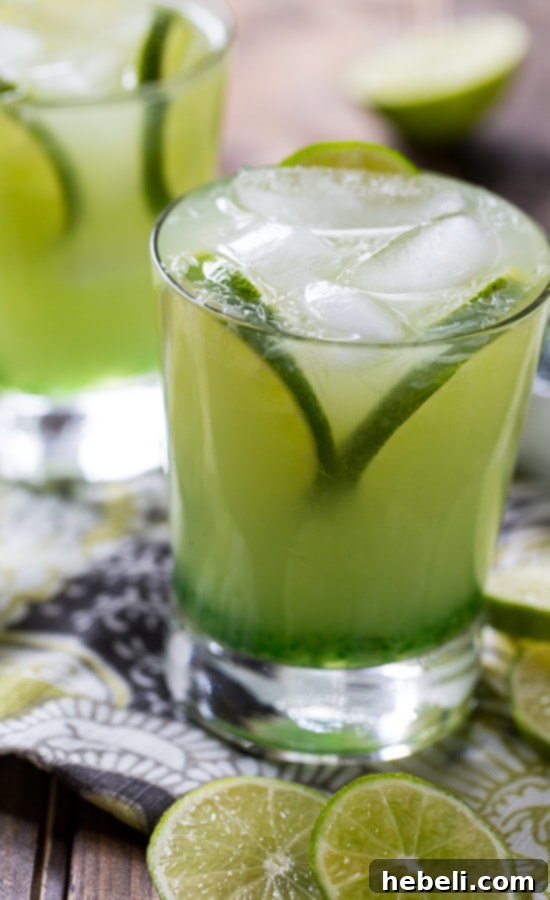 A Pepper Jelly Margarita ready to be served, with a perfectly salted rim