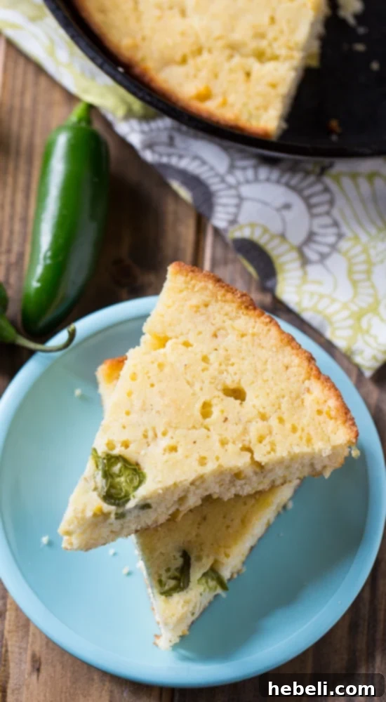 Super Moist Jalapeno Cornbread baking to perfection in a cast iron skillet