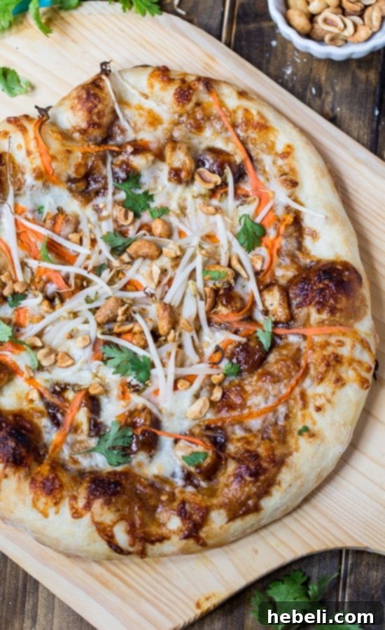 Close-up of freshly baked Thai Chicken Pizza