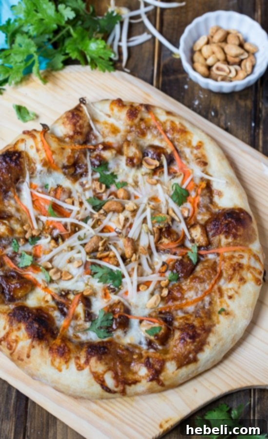 Assembling the Thai Chicken Pizza dough