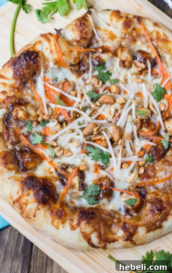 Pizza dough being prepared for Thai Chicken Pizza